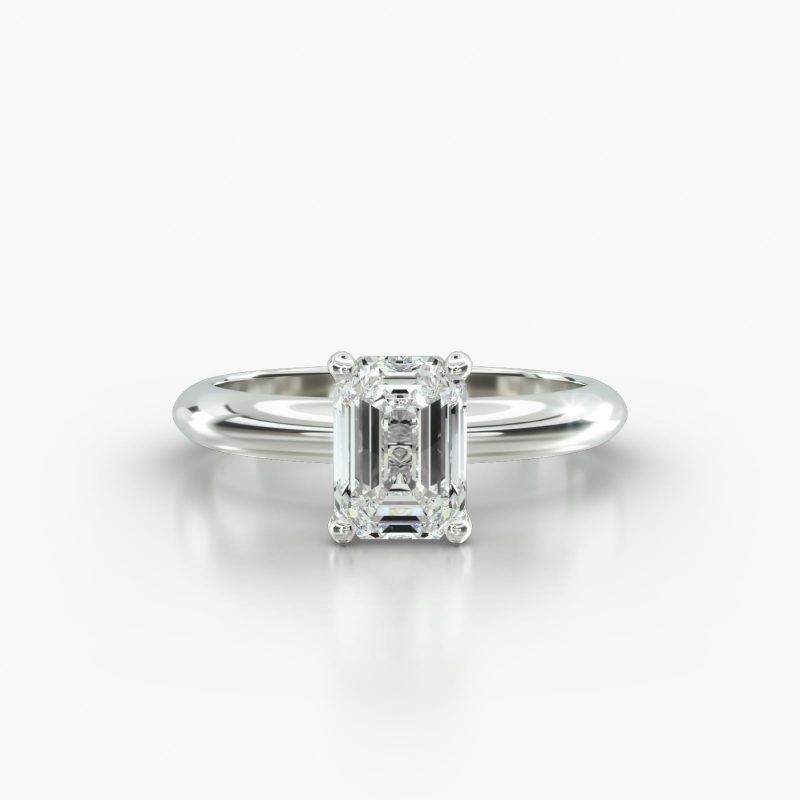 EMERALD OR RADIANT KNIFE SOLITAIRE SURPRISE DIAMOND - A