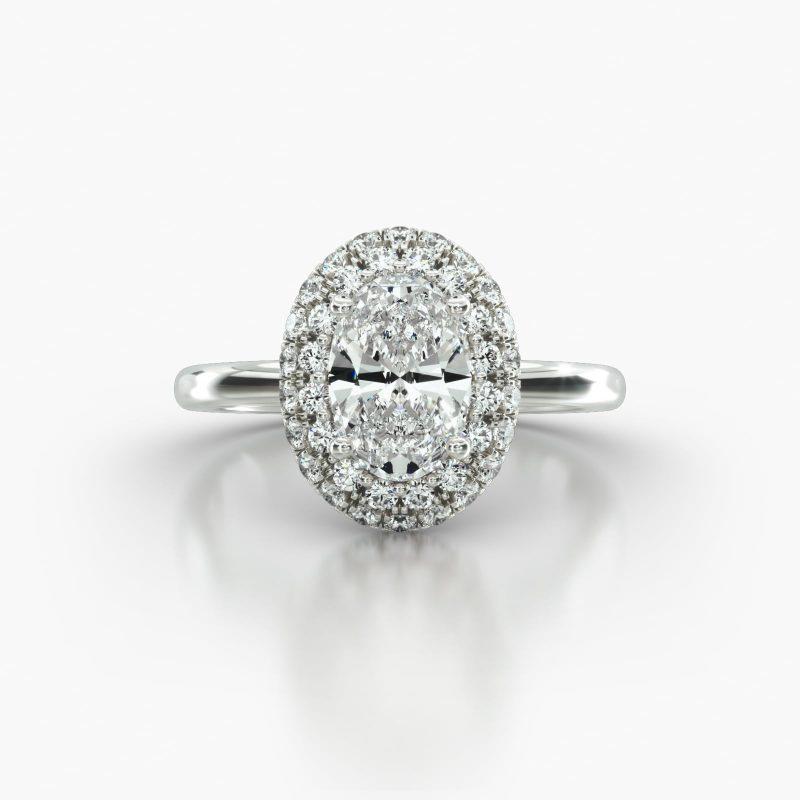 OVAL SOLITAIRE FALLING EDGE PAVE HALO - A